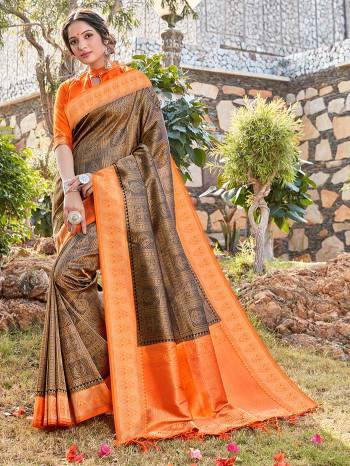 Garb This Fine Colored Saree Paired With Contreased Blouse.This Heavy Designer Wevon Saree Is Banarasi Silk Based Which Gives A Rich Look To Your Personality. Buy This Pretty Saree Now.