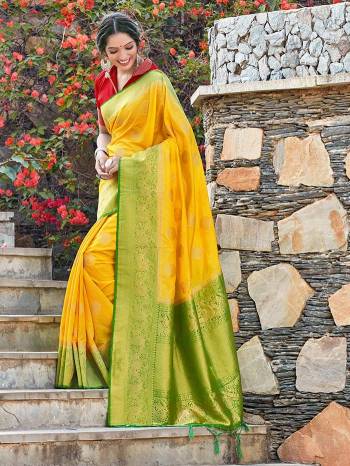 Garb This Fine Colored Saree Paired With Contreased Blouse.This Heavy Designer Wevon Saree Is Banarasi Silk Based Which Gives A Rich Look To Your Personality. Buy This Pretty Saree Now.