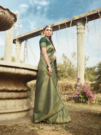 Garb This Partywear Saree Are Fine Saree Paired With Blouse.This Saree And Blouse Are Banarasi Silk With Heavy Wevon Designer Work Based Fabric. Buy This Pretty Saree Now.