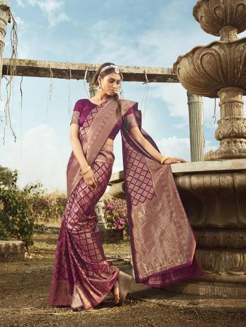 Garb This Partywear Saree Are Fine Saree Paired With Blouse.This Saree And Blouse Are Banarasi Silk With Heavy Wevon Designer Work Based Fabric. Buy This Pretty Saree Now.