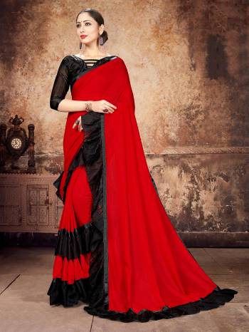 Attrective Partywear This Fine Colored Saree Paired With Contreased Blouse.This Heavy Ruffle Frill Hand Work Designer  Saree Is Georgette Based Which Gives A Rich Look To Your Personality. Buy This Pretty Saree Now.