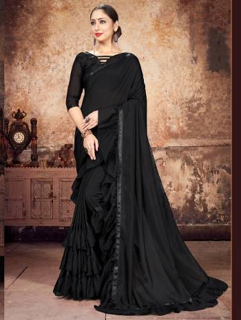 Attrective Partywear This Fine Colored Saree Paired With Contreased Blouse.This Heavy Ruffle Frill Hand Work Designer  Saree Is Georgette Based Which Gives A Rich Look To Your Personality. Buy This Pretty Saree Now.