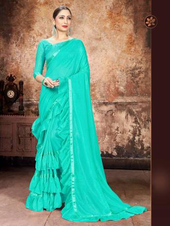 Attrective Partywear This Fine Colored Saree Paired With Contreased Blouse.This Heavy Ruffle Frill Hand Work Designer  Saree Is Georgette Based Which Gives A Rich Look To Your Personality. Buy This Pretty Saree Now.