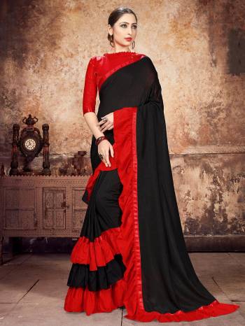 Attrective Partywear This Fine Colored Saree Paired With Contreased Blouse.This Heavy Ruffle Frill Hand Work Designer  Saree Is Georgette Based Which Gives A Rich Look To Your Personality. Buy This Pretty Saree Now.