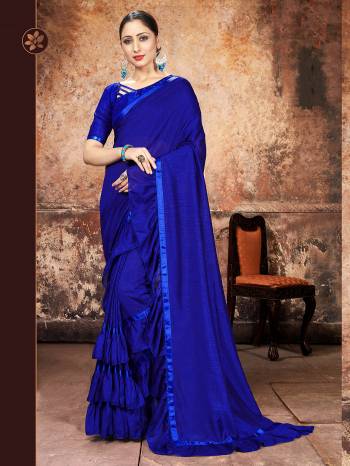 Attrective Partywear This Fine Colored Saree Paired With Contreased Blouse.This Heavy Ruffle Frill Hand Work Designer  Saree Is Georgette Based Which Gives A Rich Look To Your Personality. Buy This Pretty Saree Now.