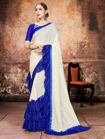 Attrective Partywear This Fine Colored Saree Paired With Contreased Blouse.This Heavy Ruffle Frill Hand Work Designer  Saree Is Georgette Based Which Gives A Rich Look To Your Personality. Buy This Pretty Saree Now.