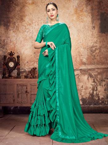 Attrective Partywear This Fine Colored Saree Paired With Contreased Blouse.This Heavy Ruffle Frill Hand Work Designer  Saree Is Georgette Based Which Gives A Rich Look To Your Personality. Buy This Pretty Saree Now.