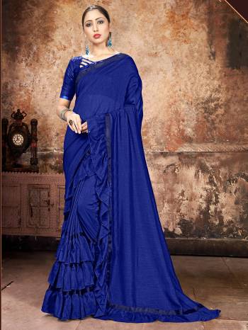 Attrective Partywear This Fine Colored Saree Paired With Contreased Blouse.This Heavy Ruffle Frill Hand Work Designer  Saree Is Georgette Based Which Gives A Rich Look To Your Personality. Buy This Pretty Saree Now.