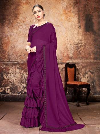 Attrective Partywear This Fine Colored Saree Paired With Contreased Blouse.This Heavy Ruffle Frill Hand Work Designer  Saree Is Georgette Based Which Gives A Rich Look To Your Personality. Buy This Pretty Saree Now.