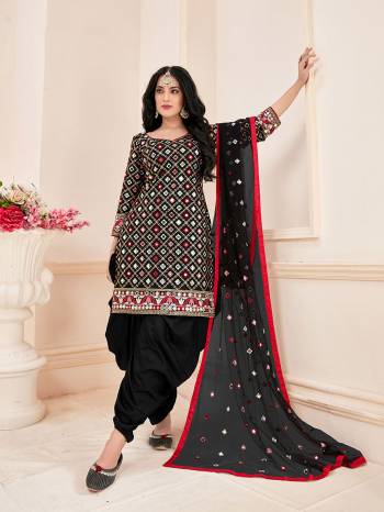 Garb This Designer Redymade Suits In Fine Color Paired. Its Designer Top And Bottom Are Jam Cotton Fabric And Dupatta Are Net With Designer Sequance Embroidery And Real Mirror Work. Buy this Suit Now.