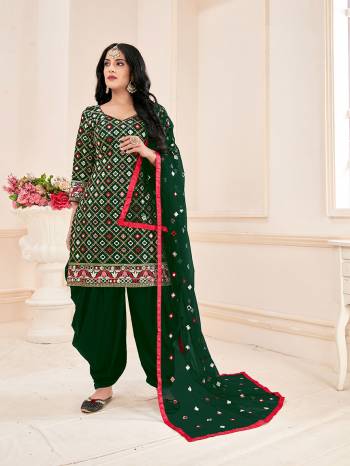 Garb This Designer Redymade Suits In Fine Color Paired. Its Designer Top And Bottom Are Jam Cotton Fabric And Dupatta Are Net With Designer Sequance Embroidery And Real Mirror Work. Buy this Suit Now.