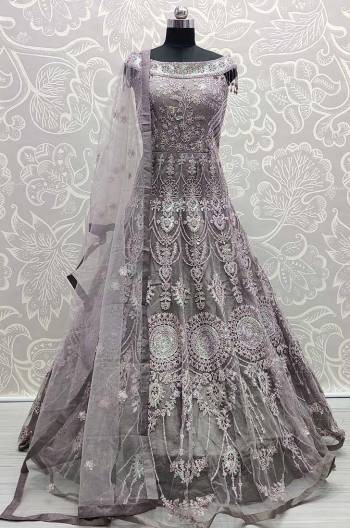 Garb This Designer Readymade Long Gown In New Fancy Color. This  Pretty Gown Is Fabricated On Net Beautified With Heavy Embroidery Work With Dupatta. Its Fabric Is Soft Towards Skin And Easy To Carry All Day Long. 