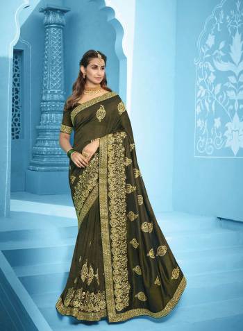 Attrective This Partywear Saree Are Fine Saree Paired With Blouse.This Saree And Blouse Are Vichitra Silk Fabric With Heavy Designer Embroidery With Diamond Work. Buy This Pretty Saree Now.