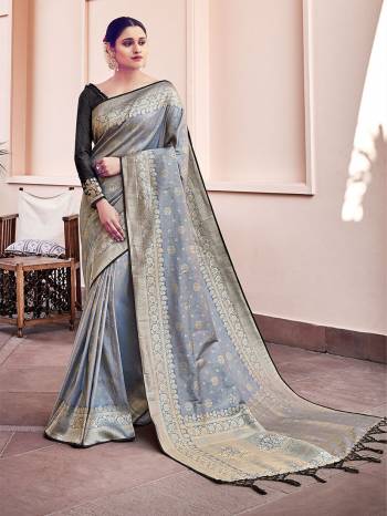 Garb This Fine Colored Saree Paired With Contreased Blouse.This Heavy Designer Wevon Saree Is Banarasi Silk Based Which Gives A Rich Look To Your Personality. Buy This Pretty Saree Now.