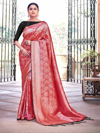 Garb This Fine Colored Saree Paired With Contreased Blouse.This Heavy Designer Wevon Saree Is Banarasi Silk Based Which Gives A Rich Look To Your Personality. Buy This Pretty Saree Now.