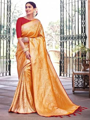 Garb This Fine Colored Saree Paired With Contreased Blouse.This Heavy Designer Wevon Saree Is Banarasi Silk Based Which Gives A Rich Look To Your Personality. Buy This Pretty Saree Now.