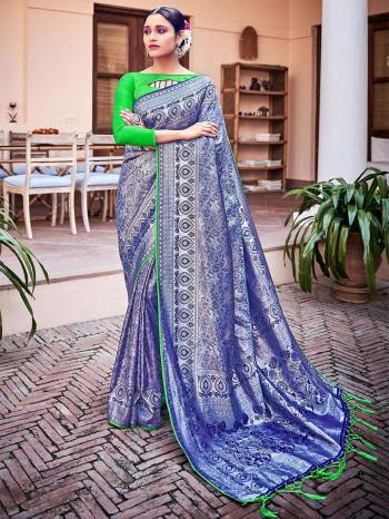 Garb This Fine Colored Saree Paired With Contreased Blouse.This Heavy Designer Wevon Saree Is Banarasi Silk Based Which Gives A Rich Look To Your Personality. Buy This Pretty Saree Now.