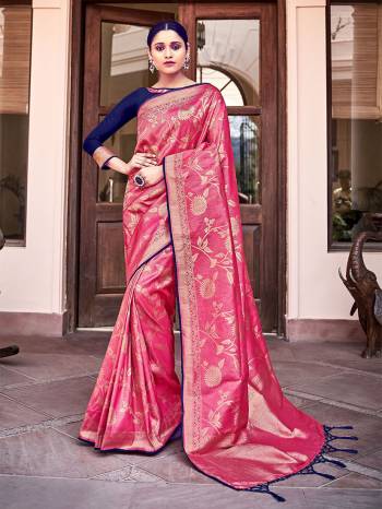 Garb This Fine Colored Saree Paired With Contreased Blouse.This Heavy Designer Wevon Saree Is Banarasi Silk Based Which Gives A Rich Look To Your Personality. Buy This Pretty Saree Now.