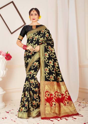 Garb This Fine Colored Saree Paired With Contreased Blouse.This Heavy Designer Wevon Saree Is Banarasi Silk Based Which Gives A Rich Look To Your Personality. Buy This Pretty Saree Now.