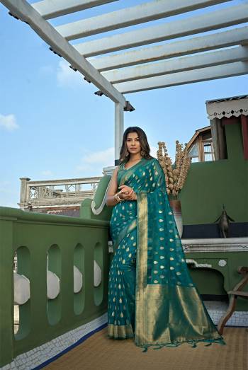 Looking This Partywear Saree Are Fine Saree Paired With Blouse.This Saree And Blouse Are Organza Fabric With Heavy Wevon Jari Designer Work. Buy This Pretty Saree Now.