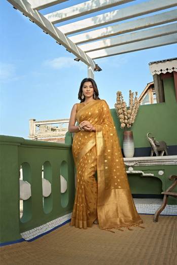 Looking This Partywear Saree Are Fine Saree Paired With Blouse.This Saree And Blouse Are Organza Fabric With Heavy Wevon Jari Designer Work. Buy This Pretty Saree Now.