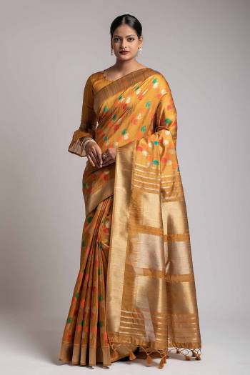 Garb This Partywear Saree Are Fine Saree Paired With Blouse.This Saree And Blouse Are Tussar Silk With Heavy Wevon Designer Work Based Fabric. Buy This Pretty Saree Now.