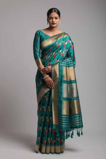 Garb This Partywear Saree Are Fine Saree Paired With Blouse.This Saree And Blouse Are Tussar Silk With Heavy Wevon Designer Work Based Fabric. Buy This Pretty Saree Now.