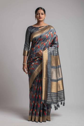 Garb This Partywear Saree Are Fine Saree Paired With Blouse.This Saree And Blouse Are Tussar Silk With Heavy Wevon Designer Work Based Fabric. Buy This Pretty Saree Now.