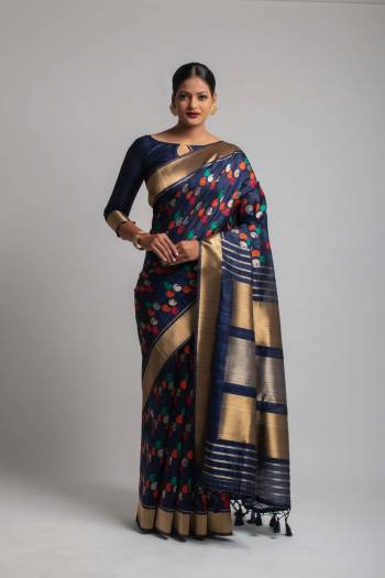 Garb This Partywear Saree Are Fine Saree Paired With Blouse.This Saree And Blouse Are Tussar Silk With Heavy Wevon Designer Work Based Fabric. Buy This Pretty Saree Now.