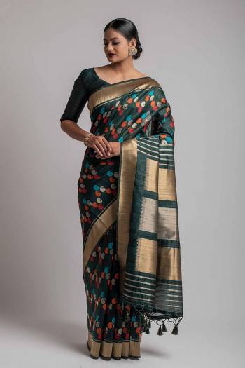 Garb This Partywear Saree Are Fine Saree Paired With Blouse.This Saree And Blouse Are Tussar Silk With Heavy Wevon Designer Work Based Fabric. Buy This Pretty Saree Now.