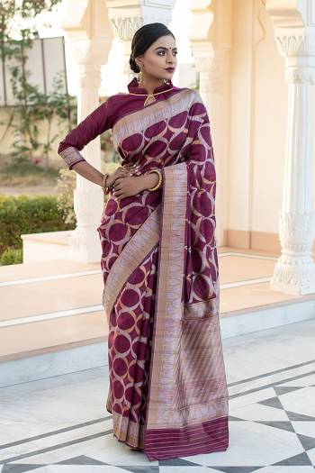 Garb This Partywear Saree Are Fine Saree Paired With Blouse.This Saree And Blouse Are Tussar Silk With Heavy Wevon Designer Work Based Fabric. Buy This Pretty Saree Now.