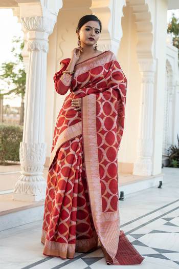 Garb This Partywear Saree Are Fine Saree Paired With Blouse.This Saree And Blouse Are Tussar Silk With Heavy Wevon Designer Work Based Fabric. Buy This Pretty Saree Now.