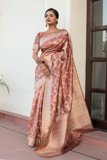 Garb This Partywear Saree Are Fine Saree Paired With Blouse.This Saree And Blouse Are Tussar Silk With Heavy Wevon Designer Work Based Fabric. Buy This Pretty Saree Now.