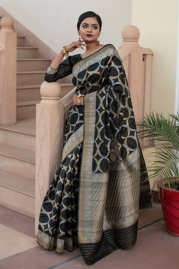 Garb This Partywear Saree Are Fine Saree Paired With Blouse.This Saree And Blouse Are Tussar Silk With Heavy Wevon Designer Work Based Fabric. Buy This Pretty Saree Now.