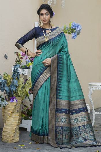 Garb This Partywear Saree Are Fine Saree Paired With Blouse.This Saree And Blouse Are Tussar Silk With Heavy Wevon Designer Work Based Fabric. Buy This Pretty Saree Now.