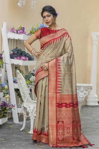 Garb This Partywear Saree Are Fine Saree Paired With Blouse.This Saree And Blouse Are Tussar Silk With Heavy Wevon Designer Work Based Fabric. Buy This Pretty Saree Now.