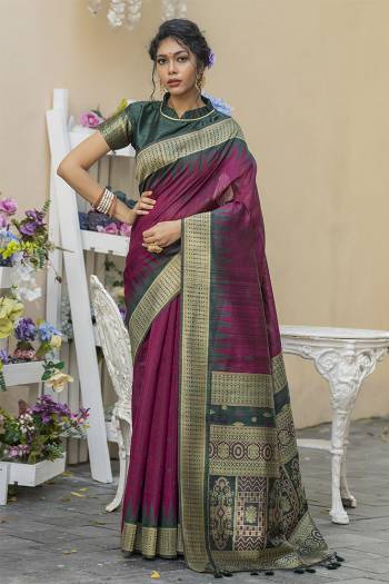 Garb This Partywear Saree Are Fine Saree Paired With Blouse.This Saree And Blouse Are Tussar Silk With Heavy Wevon Designer Work Based Fabric. Buy This Pretty Saree Now.