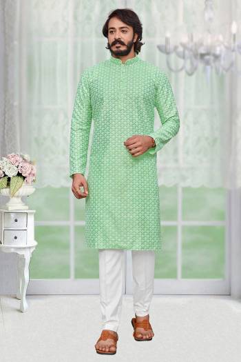 Attrective This Kurta Pajama set is a must have in a men's ethnic wardrobe.This Kurta Are Art Silk Fabric And Pajama Is Cotton Fabric With Lakhnowi Embroidery Work.