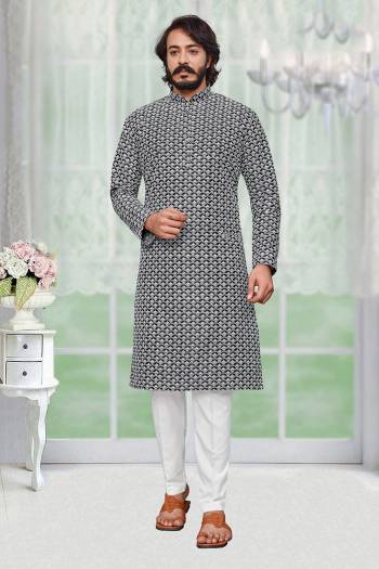 Attrective This Kurta Pajama set is a must have in a men's ethnic wardrobe.This Kurta Are Art Silk Fabric And Pajama Is Cotton Fabric With Lakhnowi Embroidery Work.