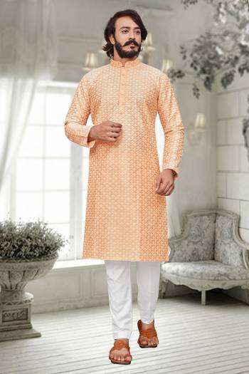 Attrective This Kurta Pajama set is a must have in a men's ethnic wardrobe.This Kurta Are Art Silk Fabric And Pajama Is Cotton Fabric With Lakhnowi Embroidery Work.