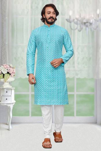 Attrective This Kurta Pajama set is a must have in a men's ethnic wardrobe.This Kurta Are Art Silk Fabric And Pajama Is Cotton Fabric With Lakhnowi Embroidery Work.