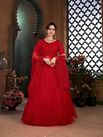 Look Attrective Partywear Heavy Designer Lehenga Choli And Dupatta In Fine Color. Lahenga Choli Fabricated On Net Beautified And  Net Dupatta With Heavy Attractive Thread Embroidery Work. 