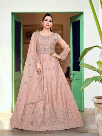 Attrective This Designer Long Length Amarkali In Lovely Color.?Its Pretty Designer Embroidery And Stone Work Top Is Butterfly Net Based Paired With Batterfly Net Fabricated Dupatta Which Gives An Attractive To The Dress.