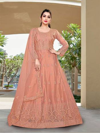 Attrective This Designer Long Length Amarkali In Lovely Color.?Its Pretty Designer Embroidery And Stone Work Top Is Butterfly Net Based Paired With Batterfly Net Fabricated Dupatta Which Gives An Attractive To The Dress.