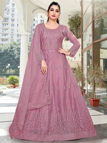 Attrective This Designer Long Length Amarkali In Lovely Color.?Its Pretty Designer Embroidery And Stone Work Top Is Butterfly Net Based Paired With Batterfly Net Fabricated Dupatta Which Gives An Attractive To The Dress.