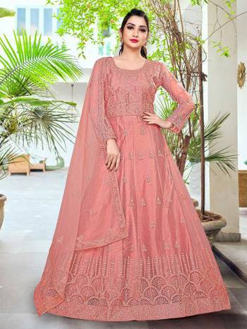 Attrective This Designer Long Length Amarkali In Lovely Color.?Its Pretty Designer Embroidery And Stone Work Top Is Butterfly Net Based Paired With Batterfly Net Fabricated Dupatta Which Gives An Attractive To The Dress.