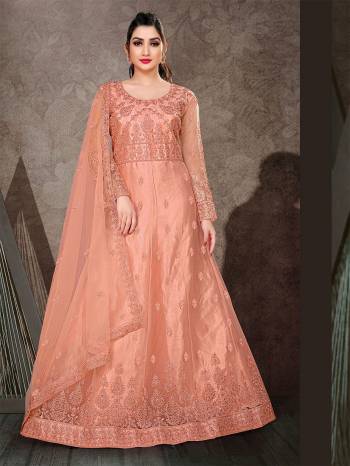 Garb This Designer Long Length Anarkali In Lovely Color.?Its Pretty Designer Embroidery And Stone Work Top Is Butterfly Net Based Paired With Batterfly Net Fabricated Dupatta Which Gives An Attractive To The Dress.