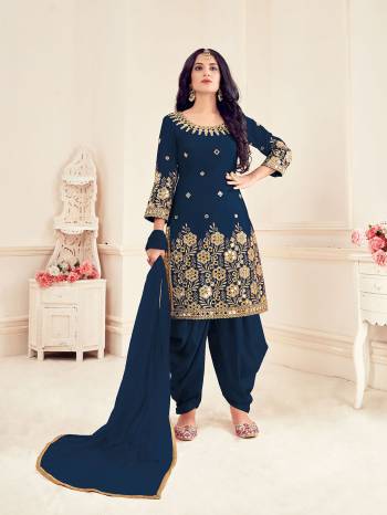 Attrective This Designer Long Length Suit In Lovely Color.?Its Pretty Designer Embroidery And Real Mirror Work Top And Bottom Are Bitalian Soft Silk Based Paired With Net Fabricated Dupatta Which Gives An Attractive To The Suit.