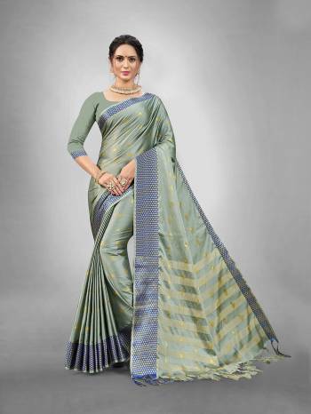 Garb This Partywear Saree Are Fine Saree Paired With Blouse.This Saree And Blouse Are Aura Silk Fabric With Heavy Wevon Designer Work. Buy This Pretty Saree Now.