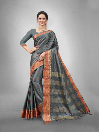 Garb This Partywear Saree Are Fine Saree Paired With Blouse.This Saree And Blouse Are Aura Silk Fabric With Heavy Wevon Designer Work. Buy This Pretty Saree Now.